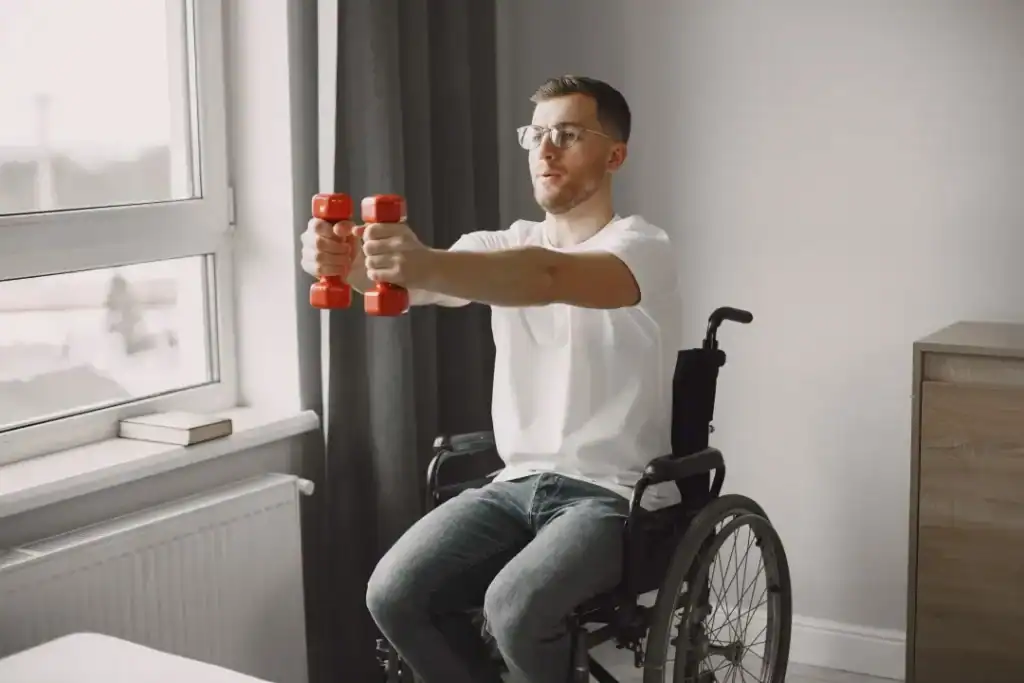 Empowering Weight Loss: A Comprehensive Guide for Individuals with Disabilities 1 Image of man doing exercise in his wheelchair to aid weight loss Wilmslow