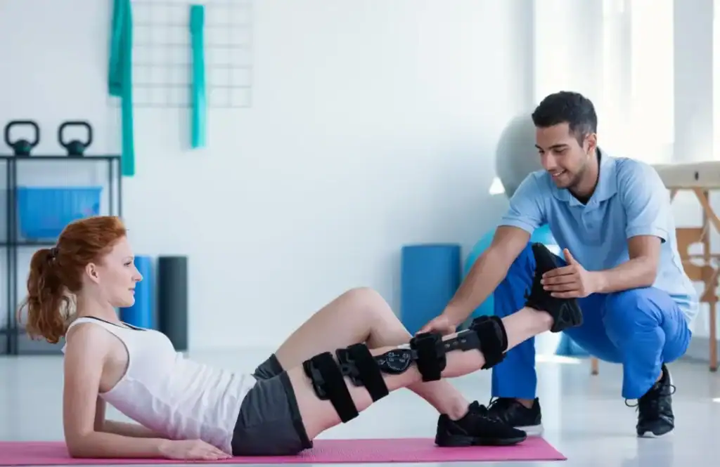 Debunking Meal Timing Myths: The Truth About Muscle Recovery 1 Woman having treatment to help muscle recovery Wilmslow after an injury
