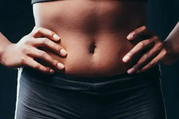 Toning Your Stomach: The Ultimate Guide to Achieving a Sculpted Stomach While Shedding Pounds 1 Image of a toned stomach after non surgical treatment Wilmslow